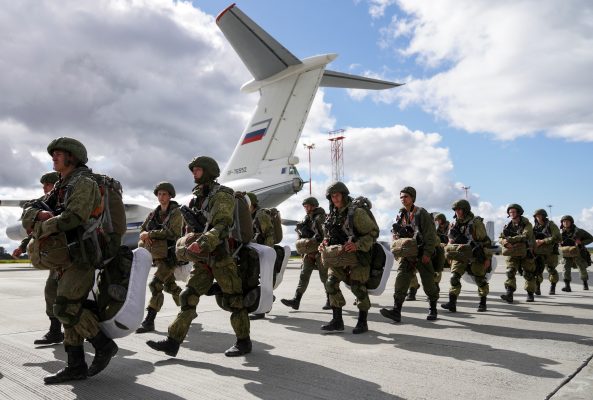 Photo: Russian paratroopers walk before boarding Ilyushin Il-76 transport planes as they take part in the military exercises "Zapad-2021" staged by the armed forces of Russia and Belarus at an aerodrome in Kaliningrad Region, Russia, September 13, 2021. Credit: REUTERS/Vitaly Nevar