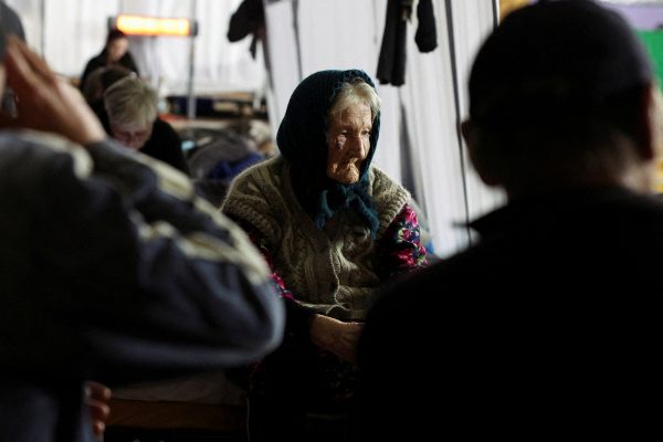 Photo: Valentina Yagmurova, a 92 year old person evacuated from the eastern frontline village of Stary Komar, spends the eve of her 93rd birthday at a transit center with other displaced people also evacuated from various eastern settlements, amid Russia's attack on Ukraine, in Pavlohrad, Dnipropetrovsk region, Ukraine March 31, 2025. Credit: REUTERS/Violeta Santos Moura
