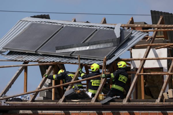 Photo: Firefighters work on the destroyed roof of a house, after Russian drones violated Polish airspace during an attack on Ukraine, with some being shot down by Poland with the backing from its NATO allies, in Wyryki, Lublin Voivodeship, Poland, September 10, 2025. Credit: REUTERS/Kacper Pempel