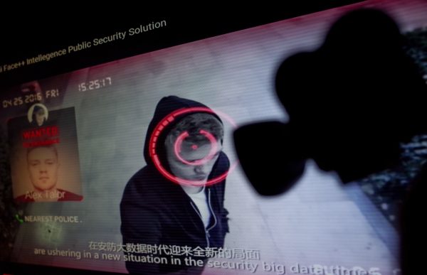 Photo: February 04, 2020: Illustration of China's facial-recognition technology with the silhouette of a mock video camera in front of screen grabs taken from a promotional video by Megvii. Megvii is a Beijing-based Chinese technology company that designs image recognition and deep-learning software, whose Face++ product is used by Chinese security authorities. Photo d'illustration de la technologie de reconnaissance faciale en Chine. Credit: Reuters