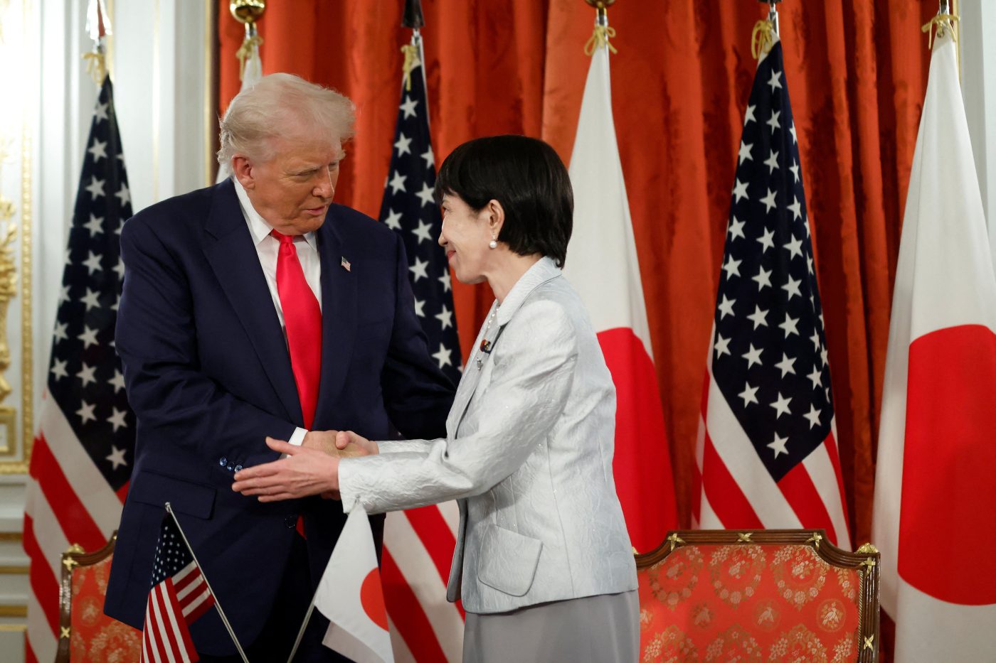 Photo: US President Donald Trump, left, and Sanae Takaichi, Japan's prime minister, during a signing ceremony for a document on the implementation of the US Japan trade deal at Akasaka Palace state guest house in Tokyo, Japan, on Tuesday, Oct. 28, 2025. Credit: Kiyoshi Ota/Pool via REUTERS