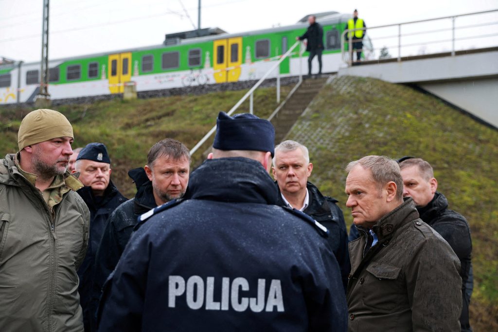 Photo: Polish Prime Minister Donald Tusk visits the site of a blast on railway of the Warsaw-Lublin line in Mika, Poland, November 17, 2025. Credit: KPRM/Handout via REUTERS