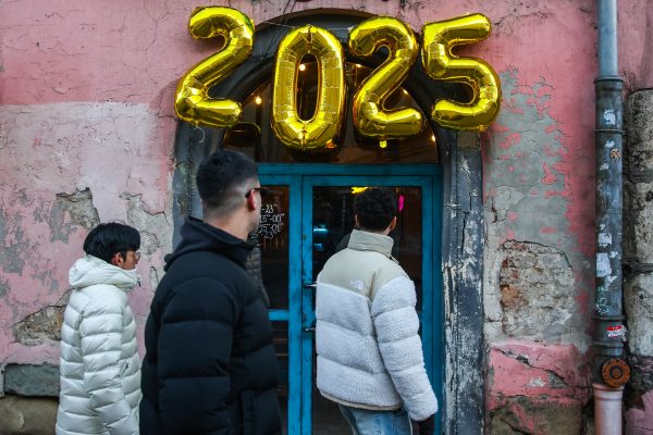Photo: Balloons with 2025 number are seen on the New Year's Eve at the entrance to a restaurant in Krakow, Poland on December 31, 2024. Credit: Beata Zawrzel/NurPhoto
