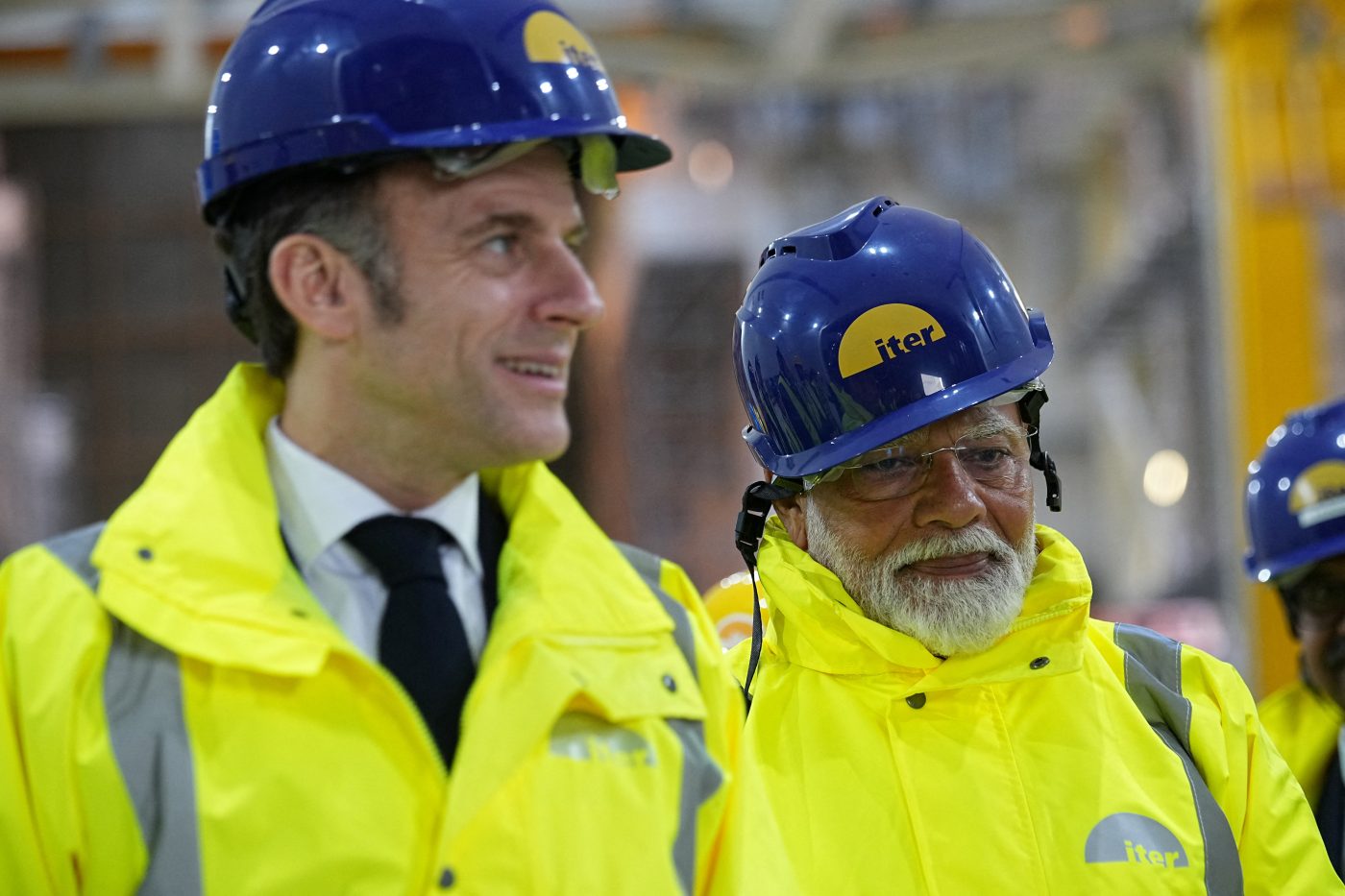 Photo: French President Emmanuel Macron and Indian Prime Minister Narendra Modi visit the ITER (International Thermonuclear Experimental Reactor) in Saint-Paul-les-Durance, southern France, Wednesday, Feb. 12, 2025. Credit: Laurent Cipriani/Pool via REUTERS