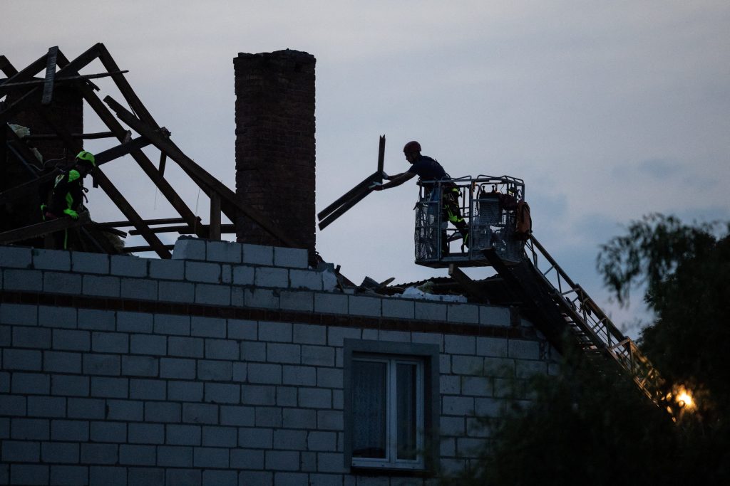 Photo: Workers repair the roof of a house damaged by a fragment of a suspected Russian drone shot down after intrusions into Polish airspace, in Wyryki municipality, Poland September 10, 2025.  Credit: Agencja Wyborcza.pl/Jakub Orzechowski/via REUTERS