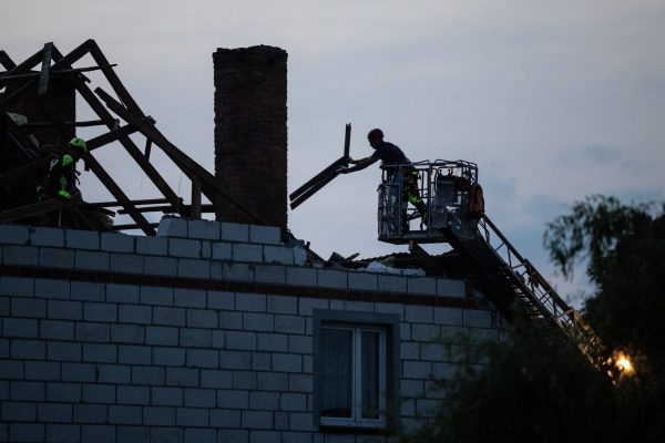 Photo: Workers repair the roof of a house damaged by a fragment of a suspected Russian drone shot down after intrusions into Polish airspace, in Wyryki municipality, Poland September 10, 2025. Credit: Agencja Wyborcza.pl/Jakub Orzechowski/via REUTERS