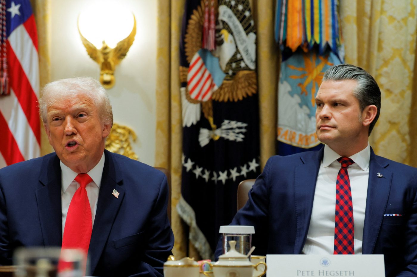 Photo: U.S. President Donald Trump attends a cabinet meeting with U.S. Secretary of Defense Pete Hegseth at the White House in Washington, D.C., U.S., December 2, 2025. Credit: REUTERS/Brian Snyder
