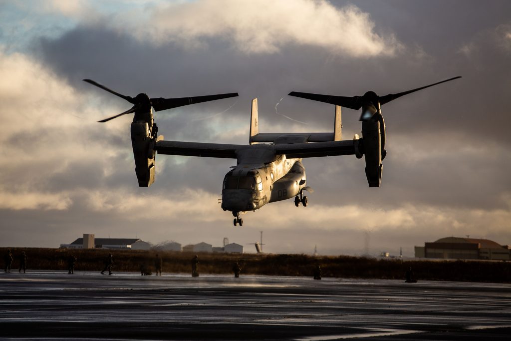 Photo: A MV-22 Osprey takes off from Keflavik, Iceland on October17, 2018. The aircraft dropped off US Marines as a part of the insertion phase of Exercise Trident Juncture 2018. The exercise brought together around 50,000 personnel from 31 NATO Allied and partner nations. Credit: NATO Flickr https://flic.kr/p/Q4KCEy.