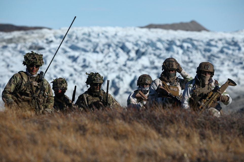Photo: Members of the Danish armed forces practice looking for potential threats during a military drill as Danish, Swedish and Norwegian home guard units together with Danish, German and French troops take part in joint military drills in Kangerlussuaq, Greenland, September 17, 2025. Credit: REUTERS/Guglielmo Mangiapane 