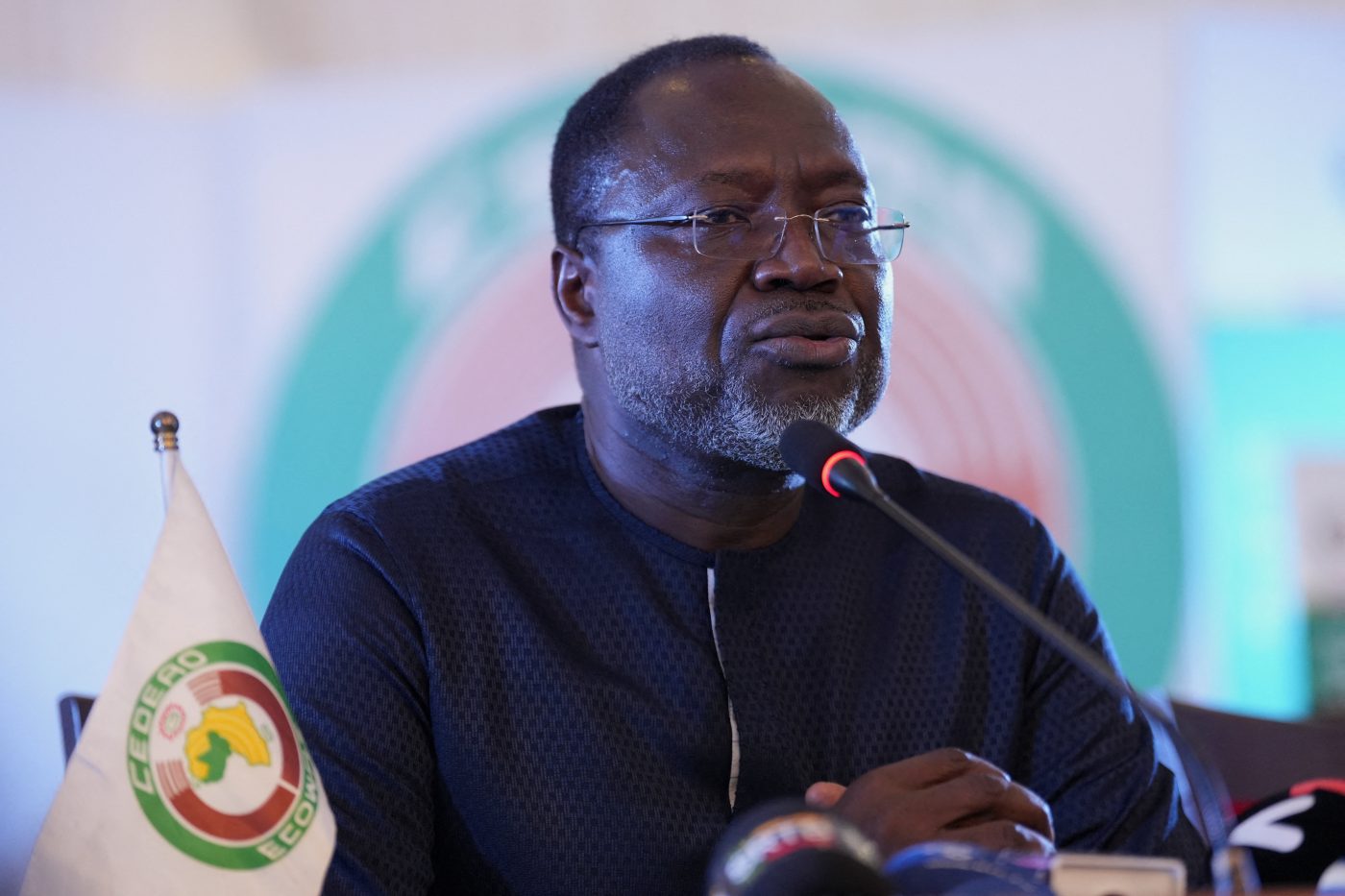 Photo: ECOWAS Commission President, Dr. Omar Alieu Touray, reacts while giving a speech after the close of the 68th Ordinary Session of the ECOWAS Authority of Heads of State and Government in Abuja, Nigeria, December 14, 2025. Credit: REUTERS/Marvellous Durowaiye